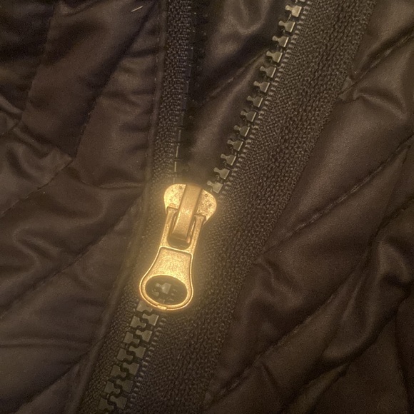 Beautiful black jacket with a symmetrical zipper. No holes or rips or tears - Picture 2 of 3